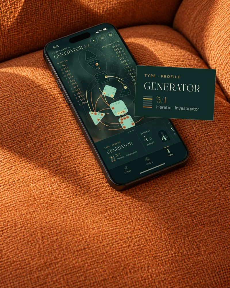 A phone on a rust-red sofa shows the chart Generator 5/1, next to it the type and profile card