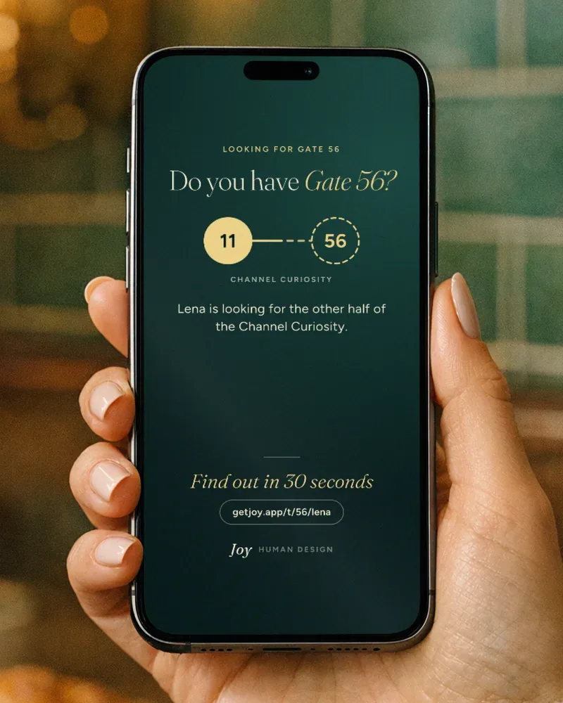 A hand holds a phone with the card Do you have Gate 56? in a café